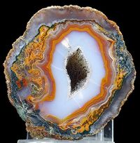 Agate | #Geology #GeologyPage #Agate #Mineral Locality: Asni Al Haouz Province Marrakech-Tensift-El Haouz Region Morocco Size: 6.2 x 5.8 x 2.6 cm Weight: 115 g Photo Copyright Spirifer Minerals Geology Page www.geologypage.com