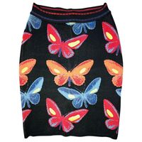Azzedine Alaia Vintage Butterfly Fitted Skirt XS Iconic Piece!!! Highly Collectible! Alaïa knitted mini skirt with butterfly pattern throughout and elasticized waistband. All Eyes on Alaïa For the last half-century, the world’s most fashionable and adventuresome women have turned to Azzedine Alaïa for body-enhancing clothes that give them beauty, sensuality, and confidence, thanks to the meticulous craftsman’s peerless adulation of the female form. Amy Fine Collins unravels the evolution of the
