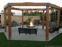 pergola with swing and fire pit | www.CypressMoonPorchSwings.com