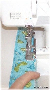 Pam from Off the Cuff Style shows how she achieves a perfect rolled hem on a serger. Once you master the serged rolled hem, you can use it to quickly finish off the edges of napkins, tableclothes,…