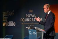 The royal stood in front of a sign reading his new organisation name - Royal Foundation of...