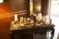 Witch's Table: Originals prop master, Dort Clark, breaks down how the show crafts a witch's table: "We use a lot of bones and sage in our witchy world. On this particular table, you will notice some very unique bottles. These are Egyptian perfume bottles. Along with some rooster claws, you throw in some bones, dragon's blood incense (in the baggie), feathers, a splash of crystals and voila — a 'witchy table.'"