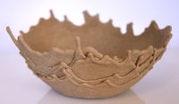 "Sand Bowls- just sand mixed with glue and dripped over a bowl until it hardens. Perfect for holding your summer seashell collection."