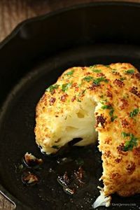 Slice out of baked cauliflower recipe. An interesting take on a great vegetable at the dinner table.