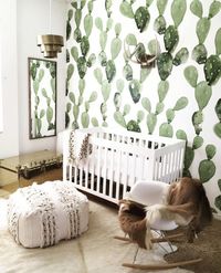 I absolutely love this nursery with the cacti on the wall and all the neutral colors! #nursery #babyroom #cactiwallpaper #desertvibes #neutralnursery
