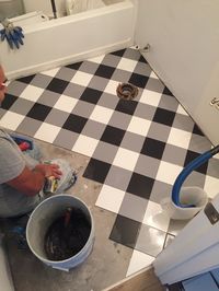 When we moved in to our house, we knew that we wanted to renovate our downstairs bathroom. It wasn’t much to look at, with it’s vinyl floor, builder grade cabinet, and plain white walls…