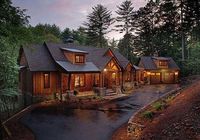 This splendid Mountain home plan is filled with amenities such as vaulted ceilings, lots of covered porch space and a finished lower level complete with exercise room! The vaulted gathering room is massive with a cozy fireplace and big windows to highlight the views. Even the laundry room is spacious with lots of counter space. Double doors in the deluxe master suite open to a private rear deck. The master bath is finished with a large walk-in shower, jetted tub and two walk-in closets. Windows
