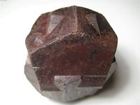 Limonite psm after Pyrite (twin, variety iron cross), Muzo mining district, Western Emerald Belt, Boyacá Department, Colombia. Size 8 cm. Iron cross
