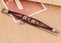 Woven PU leather charm bracelet. Easy-hook clasp closure. Full length: 20 cm / 7.9″ inches. Brown braided leather. Metal charms. Best gift for friends or lovers.
