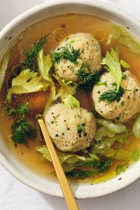 NYT Cooking: Greater than the sum of its parts, matzo ball soup is a wonderful combination of three very simple things: chicken broth (golden brown, deeply savory, lightly seasoned), matzo balls (tender, eggy, schmaltzy dumplings made with ground matzo) and garnish (celery and fresh dill, lots of it). The key to keeping the chicken juicy, tender and something you’re excited to eat is by gently simmering the...