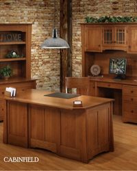 An Amish office furniture set with graceful arches and scalloped bases showing off the skilled craftsmanship and the beauty of hardwood furniture. Featuring a computer workstation with Amish hutch option, lateral file cabinet with bookshelf option, executive Amish desk, and coordinating optional swivel desk chair.