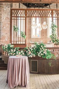 Leaf + Petal added lush garland of neutral and blush garden florals for a wedding at Felicity Church in New Orleans.