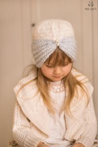 This is a knitting pattern for turban hat or headband Margot. Knitted with one or more colors of yarn, started flat and then in the round. The pattern is suitable for a knitter with some experience as it involves picking up stitches along one edge for the hat body. Classic hat, which can be decorated with buttons or beads for some extra sparkle.You can use this pattern for making a headband, that is knitting only the ribbed bottom part of the hat.Sizes: baby/toddler/child/woman...