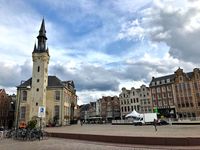 Imagine sitting beneath the shadow of a 14th century tower clock, sipping a Belgian beer and listening to the carillon play. A pleasant server brings you a plate of local cold cuts and cheeses to complement your beverage. The bells of the carillon play a familiar tune that make your heart sing as you enjoy an afternoon drinking in the culture while you visit Lier. #belgium #smalltowns #traveldestinations