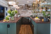 This home bar is situated in a 600 square feet ADU in the back of an Historic Downtown Los Gatos home. The design of this space fits perfectly into the footprint of the property with a connecting patio, firepit and lounge space that brings an indoor-outdoor flow perfect for entertaining. #homebar #entertaining #bar #happyhourathome #homebardesignideas #homebarideas #guesthouse #casita #AccessoryDwellingUnit #palmerindustries #glassshelving #brassshelving #homebarinspiration #homebarinspo