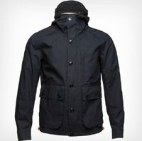 Barbour Hardmarsh jacket with numerous pockets through the front, an adjustable drawstring hem and high stance peaked hood.