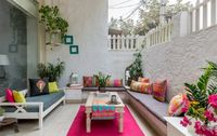 Pepper your home with cushions, and lots of them! Get covers in bright popping colours such as pinks and oranges in floral or geometric prints. Photography by Pulkit Sehgal