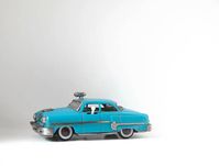 Old toy police car. almost a half century old. - vintage toys stock pictures, royalty-free photos & images