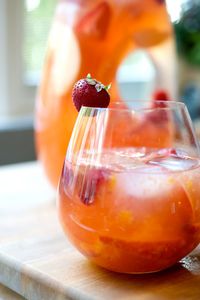 Sangria Bianca ~ White wine, peaches, nectarines, oranges, and strawberries.