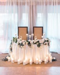 Sweetheart table. Reused the garland from the floral wreath for the sweetheart table.