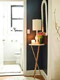 Small home uses every available space for storage and adding pretty pieces