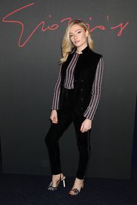 Clara Paget in Giorgio Armani.