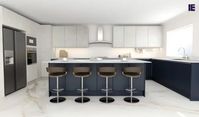Try out something unique for your kitchen with our u-shaped handleless kitchen units. Our stunning u-shaped handleless matt kitchen is finished in indigo blue, which comes with a kitchen cupboard, an oven, and better storage options.