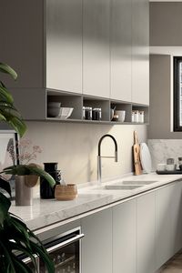 A touch of attractive design represented by the Steel finish handles at the top of the door for the base units and built-in for the larder units