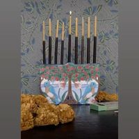 Andrea Shemilt Kashanipour on Instagram: "It is so wonderful to have a vendor like @nickeykehoe. This is the third year that I have designed a menorah for their shop during the holiday season. It’s an honor! #nickeykehoe, #artknacky, #menorah"