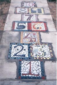 mosaic hopscotch! truly may need to incorporate into landscaping in the future (with my giant outdoor scrabble board...) by eddie
