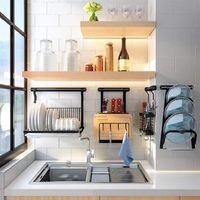 This dish drainer puts your walls to work and free up space on your counter for slicing, dicing, and kneading the dough. It offers modern function in a coordinated rustic style especially great for small kitchens, such as recreational vehicles. If you like to travel in an RV, this dish rack will be a good choice. | zhongshanginter Drying Stainless Steel Dish Rack Stainless Steel in Gray, Size 14.9 H x 15.7 W x 10.4 D in | Wayfair | Organization