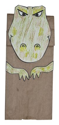 Free pdf pattern to make a T-Rex paper bag puppet. Need a puppet with a moving mouth? Our T-Rex Hand Puppet Sewing Pattern is available at our online store at https://thetucsonpuppetlady.com/downloads/t-rex-puppet-pattern/. Visit our store to see all of the other animal sewing patterns that we carry. We also have person/people puppet sewing patterns too!