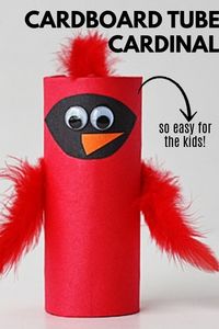 This cardboard tube cardinal is the perfect winter recycled project for kids! All you need is a cardboard tube, construction paper, feathers, & googly eyes! #cardboardtube #constructionpaper #googlyeyes #kidscrafts #recycledkidscrafts #easykidscrafts #craftsbyamanda