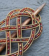 Upcycled guitar strings make a pretty barrette. I have so many of these lying around!