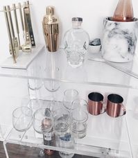 Newest addition to my apartment is creating a Bar Cart. Been obsessed with this concept and love the way it looks! Not finished, but functioning. #DrinkUp #UnlessYoureUnder21 #ThenDont