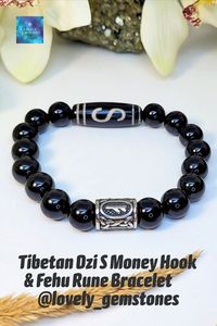 New addition to our Tibetan Dzi bracelets - S money Hook Feng Shui Bracelet with Fehu Rune and black onyx beads. This black and silver bracelet is a great Money, Wealth, Abundance and Good Health talisman amulet for men and women, and a perfect gift for birthday, any holiday or occasion.
• Please follow us for updates on:
Instagram, Pinterest and Tik Tok @lovely_gemstones
