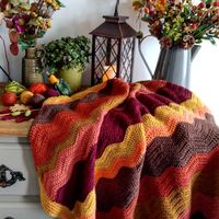Autumn ripple blanket by Sarah-Jane Ireland.
