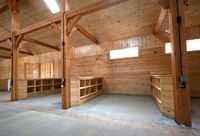 Grooming Stalls. Clearly not this big, but I like the idea of storage built in for brushes.