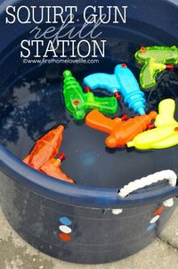 Get ready for the Fourth of July by creating a Squirt Gun Station for the kids to cool down! #frogtape #shapetape #ad