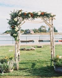 This birch branch chuppah was decorated with magnolia leaves, hydrangeas, blackberry branches, and eucalyptus.