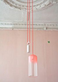 Gradient Lamp by Studio WM. | A R T N A U - Gradient Lamp by Studio WM. Made from hand-blown glass, the diffused lampshade features a subtle gradient that fades from coloured opaque to transparent. Custom coloured yarn is braided onto the electrical cord that has a small socket attached. Because the colour shows a fluent transition into the glass, it gives the lamp a floating impression. ⊥
