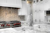 Gorgeous Los Altos Renovation. This home transformation included a major kitchen project that redesigned the entire great room space. Incorporating dual islands, ceiling soffits and skylights brings beautiful volume and light into the large space. A blended transitional styling sets the stage for this wonderful family to enjoy their amazing new home! #kitchendesign #dualislands #soffits #ceilingdetail #whitekitchen #greatroom #lighting #kitchenlighting