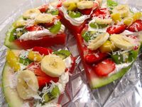 Watermelon fruit pizza - slice watermelon, top with yogurt, strawberry preserves, or cream cheese. Then add sliced bananas, strawberries, blueberries, shredded coconut or any other fruit or veggie you like!