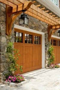 Love the pergola detail above the door. Could be a very nice detail to add over our large shed garage door... #SummerLovin
