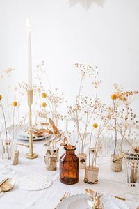 Love these dried flower wedding centrepiece ideas. Cost effective and adorable. For more unconventional wedding ideas visit www.bridedisrupted.com