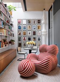 Though the peaceful, natural surrounds of sea and mature trees may soak up the limelight on this property, with an interiors scheme by Juliette Arent and Sarah-Jane Pyke, this home's statement furniture, Australian art-covered walls and warm palette light up the everyday lives of its inhabitants.