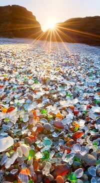 Glass Beach is a beach in MacKerricher State Park near Fort Bragg, California that is abundant in sea glass created from years of dumping garbage into an area of coastline near the northern part of the town. In the early 20th century | cynthia reccord