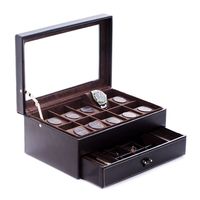 Keep your jewelry organized in style with this Black Leather 10 Watch Case with Glass Top, Drawer for Cufflinks & Pens. This elegant looking box is crafted from premium leather and includes compartments for 10 watches, and a drawer for cuff links, pens, and other personal items. It’s a great way to keep your personal effects securely in place and safe from dust and elements. Great to have as a personal organizer, and also great for gift-giving ideas. Personalize it with an engraving on the gla