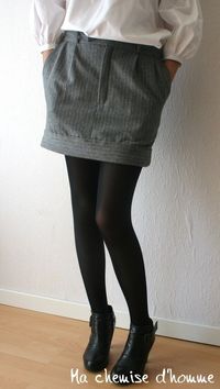 Recycled man's suit pant into a short skirt. Fun way to upcycle men's wool dress pants...now to find someone to sew it for Katie.