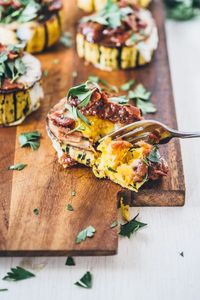 An easy weekend brunch option with roasted delicata squash, eggs, tomato jam, bacon and fresh parsley. Paleo and Whole30 friendly! | www.sweetlizzy.ca | #paleo #whole30 #breakfast #recipe #healthy #glutenfree #diaryfree #grainfree #delicatasquash #eg